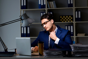 Employee working late to finish important deliverable task