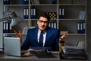 Employee working late to finish important deliverable task