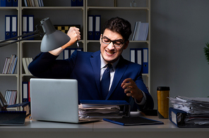 Employee working late to finish important deliverable task