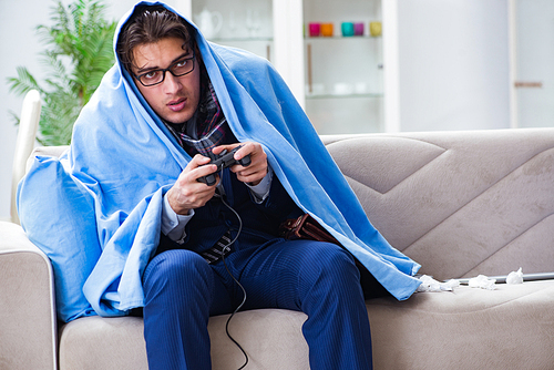 Employee suffering from flue playing computer game at home