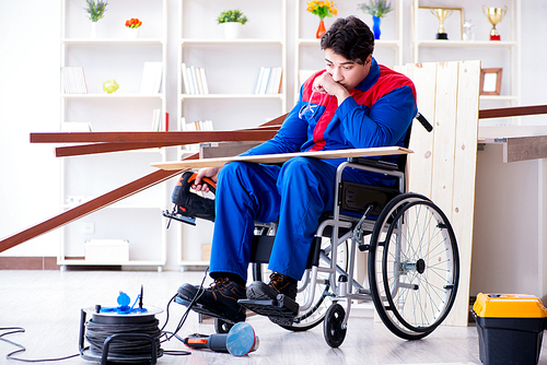 Disabled man working with circular saw