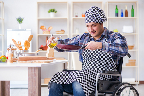 Disabled young husband frying at kitchen