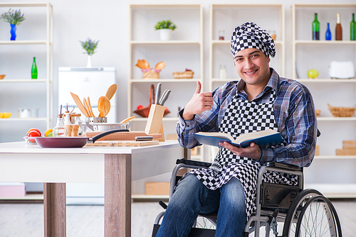 Young man cook with book of food recipes