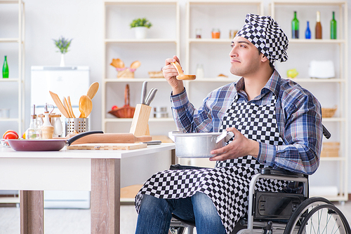 Disabled man preparing soup at kitchen