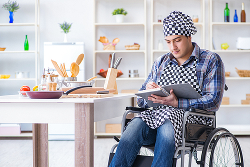 Young man cook with book of food recipes