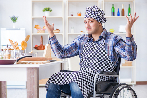 Disabled young man husband working in kitchen