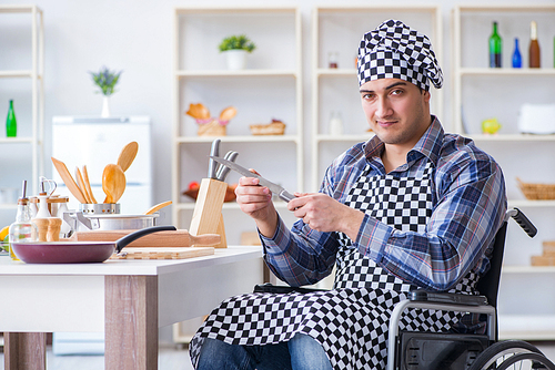 Disabled young man husband working in kitchen