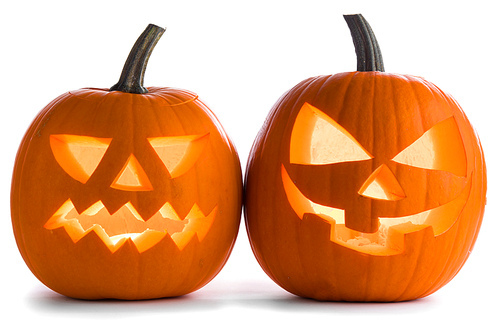 Two Halloween Pumpkins isolated on white