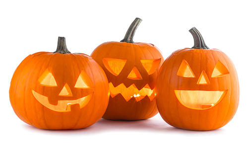 Three Halloween Pumpkins isolated on white