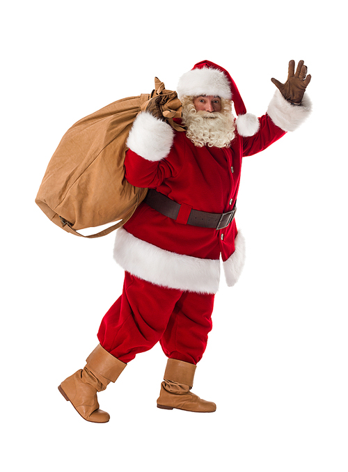 Santa Claus walking with his big bag Full-Length Portrait