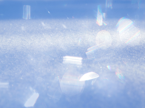 abstract background of snow texture sparkling in the sun