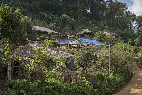 Thatched roofed houses in village in mountainous area, Chiang Rai, Thailand