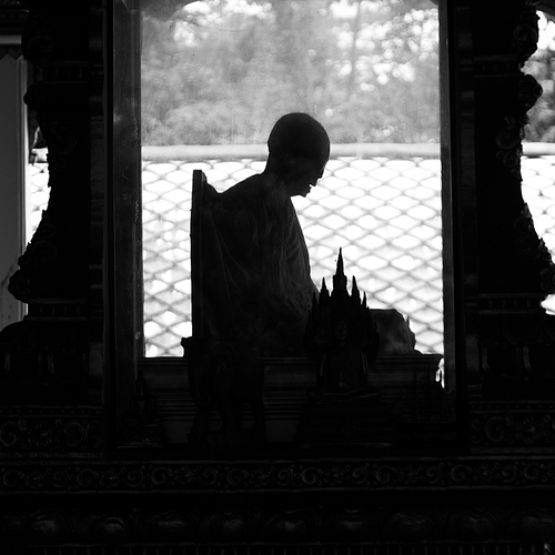 Silhouette of mummified monk in temple, Koh Samui, Surat Thani Province, Thailand