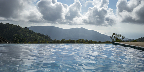 Swimming pool with mountains in background, Koh Samui, Surat Thani Province, Thailand