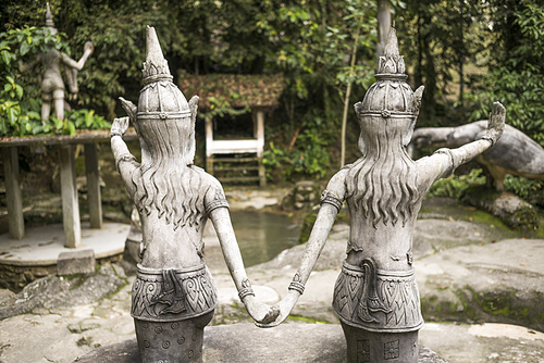 Rear view of two statues in Heaven's Garden, Koh Samui, Surat Thani Province, Thailand