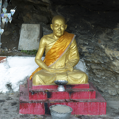 Golden statue in temple, Mount Phousi, Luang Prabang, Laos