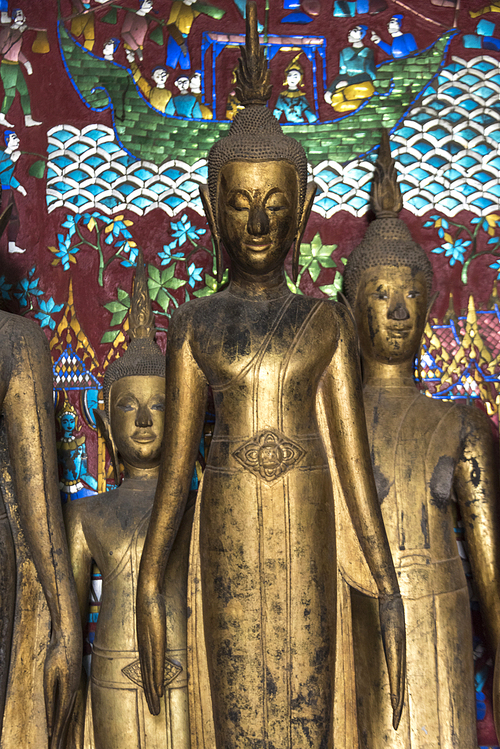 Statues in temple, Wat Xieng Thong temple, Luang Prabang, Laos