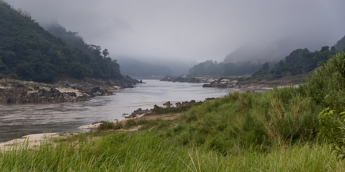 Scenic view of river flowing through mountains, River Mekong, Laos