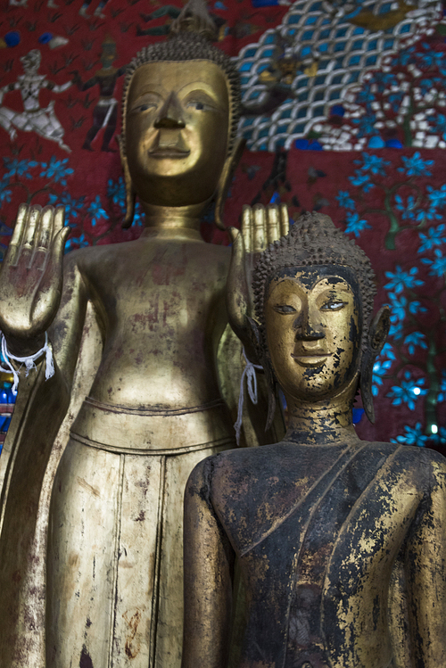 Statues in temple, Wat Xieng Thong temple, Luang Prabang, Laos