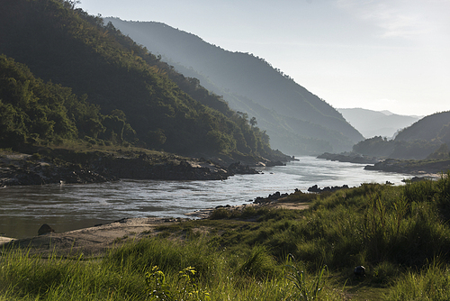 Scenic view of river flowing through mountains, River Mekong, Oudomxay Province, Laos