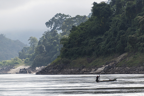 Fisherman with his net in River Mekong, Laos