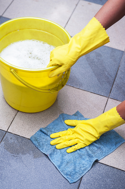 Cleaning concept. Closeup photo of woman cleaning at the home