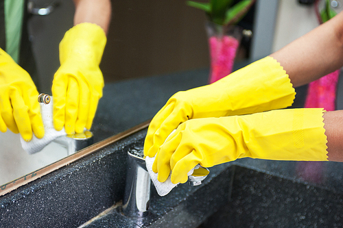 Cleaning concept. Closeup photo of woman cleaning bathroom