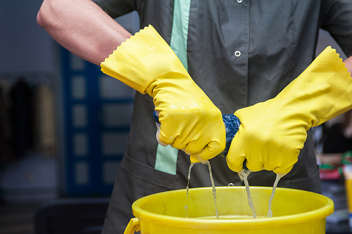 Cleaning concept. Closeup photo of woman cleaning at the home