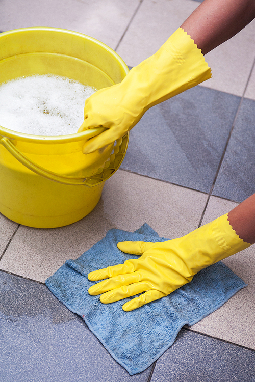 Cleaning concept. Closeup photo of woman cleaning at the home