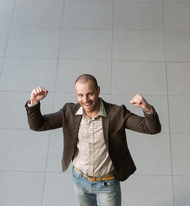 Top view of successful positive businessman