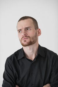 Portrait of pensive businessman looking at the window