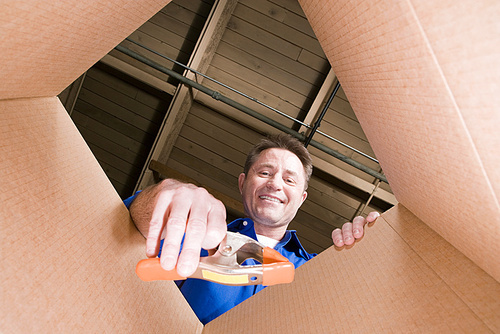 Man and cardboard box