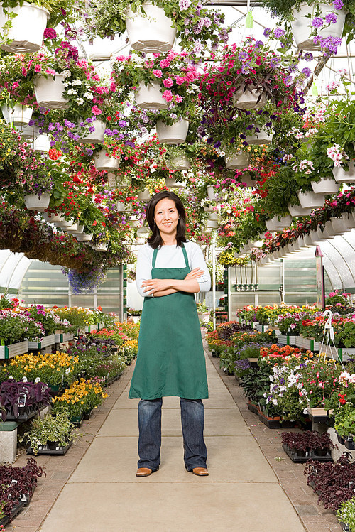 Shop assistant in a green house