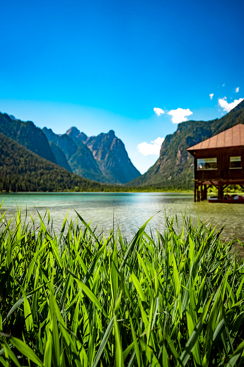 Lake Dobbiaco in the Dolomites, Beautiful Nature Italy natural landscape Alps.