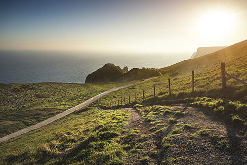 Sunset landscape image of Durdle Door on Jurassic Coast in England