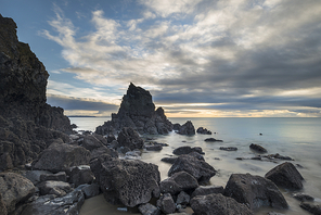 Beautiful sunrise landscape image of Barafundle Bay on Pembrokeshire Coast in Wales