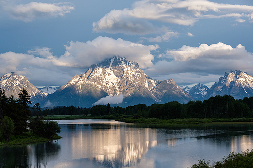 Grand Teton Mountains from Oxbow Bend on the Snake River at morning. Grand Teton National Park, Wyoming, USA.