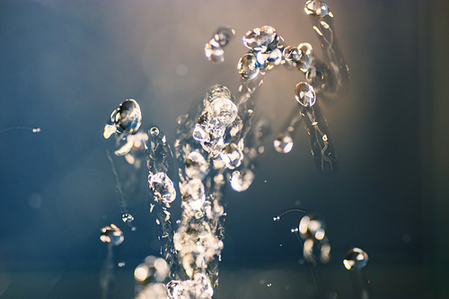 Splash of water freezed in air by short flash, copyspace