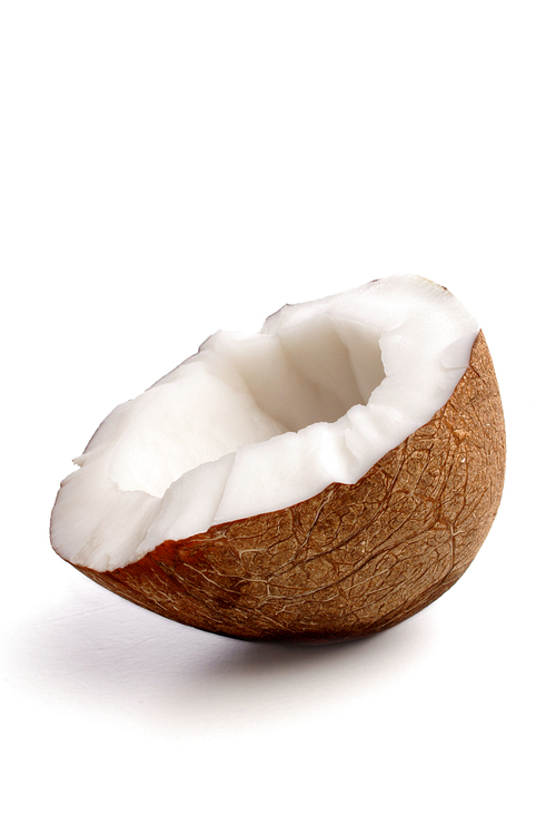 Studio shot of halved coconut