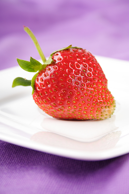 Strawberry on plate - studio shot