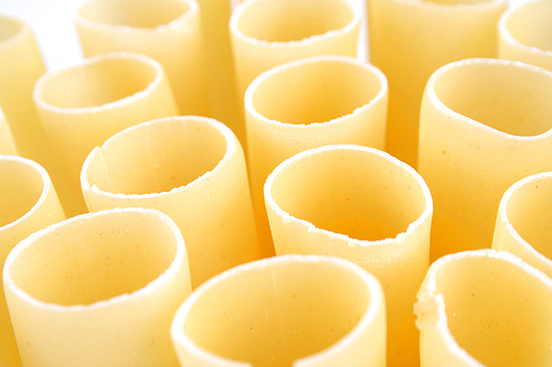 Cannelloni raw pasta on white background