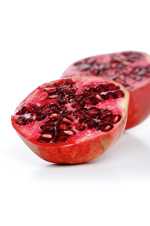 Studio shot of pomegranate fruit