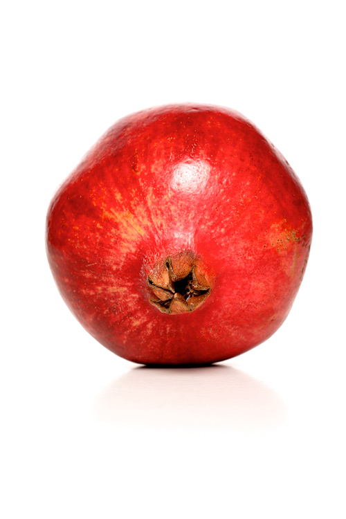 Studio shot of pomegranate fruit