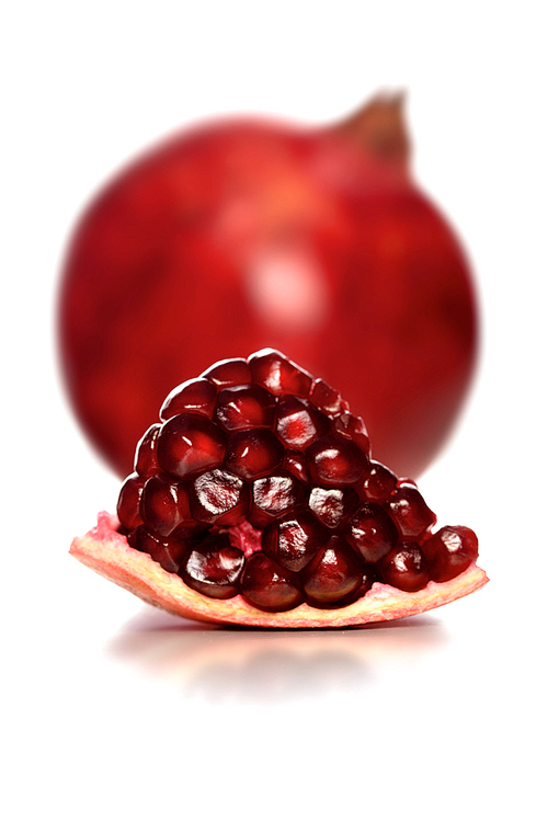 Studio shot of pomegranate fruit