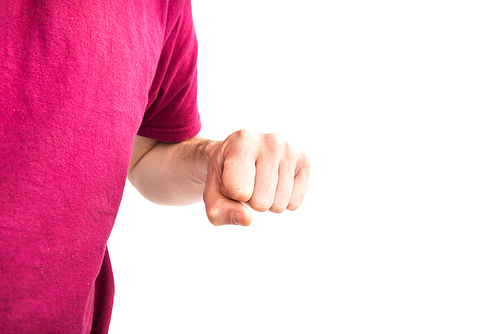 Man in t-shirt with clenched fist isolated on white