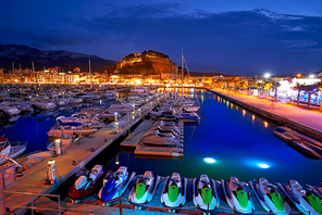 Denia sunset with castle and marina at Alicante in Spain