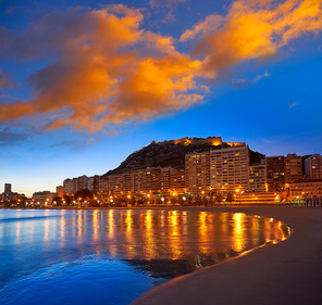 Alicante skyline at sunset from Postiguet beach in spain