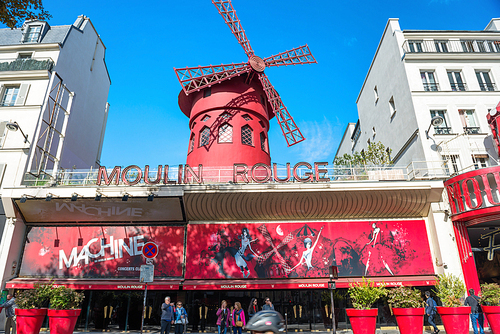 PARIS, FRANCE - SEPTEMBER 24, 2018: Moulin Rouge. Moulin Rouge is landmark cabaret built in 1889, locating in Paris Pigalle  red light district in Paris, France on September 24, 2018