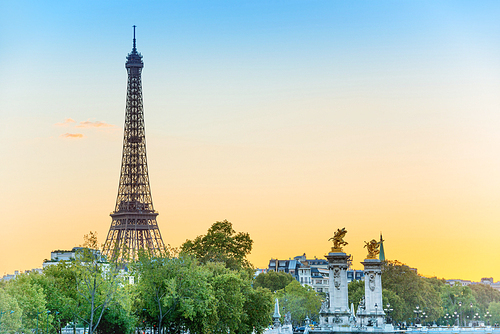 Beautiful vieu to Eiffel Tower and Pont Alexandre III at sunset. Paris, France