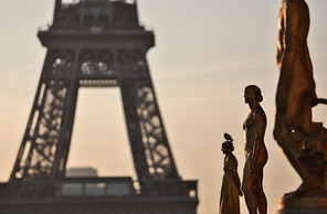 View of the Eiffel tower at sunrise from the Trocadero gardens, Paris.